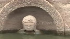 600-year-old buddha emerges from reservoir in China