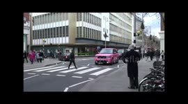 Katie Price   driving down The Kings road in Pink range rover