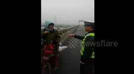 Man riding bike home for Chinese New Year goes in the wrong direction for a month