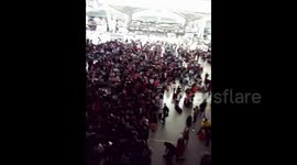 Travel chaos as thousands head home for New Year celebrations in China
