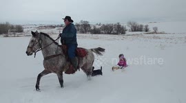 Horse-drawn toboggan ride is the best way to dash through the snow!