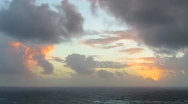 Beautiful sunrise on the tiny idyllic volcanic island Petite Martinique, Grenada, Caribbean.