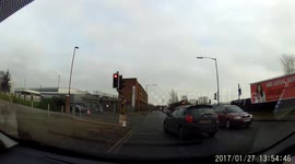 Pedestrian nearly hit by red light runner in Birmingham
