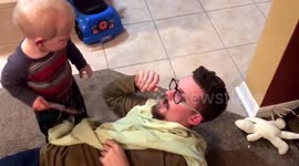 Toddler JUST wants his dad to read him a book