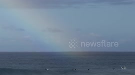 Jack Johnson surfs perfect waves in the North Shore