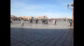 10. A vendor selling CDs from a cart, Jemaa el-Fna square, Marrakesh.