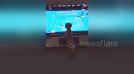 Dog enjoys Australian Open tennis