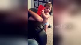 Newsflare Edit - Attempt at drinking from cup!