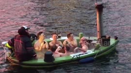 Lads enjoy sub-zero floating champagne jacuzzi