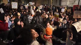 Protesters chant 'let's deport Theresa May' outside 10 Downing Street