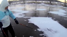 Men go ice-skating on frozen sea in Finland
