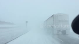 Lorry lifts up so much snow it blinds driver trying to overtake