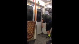 Man laughs uncontrollably on London train