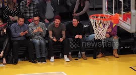 Football Star  David Beckham and Dave Gardner, husband of Liv Tyler enjoy a night out at the Los Angeles Lakers vs the Denver Nuggets basketball game
