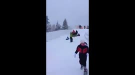 Dad and lad snowboarding fail slow-mo