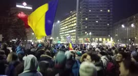 People jump during protest in Bucharest