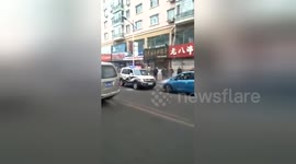 Alleged drug driver rams police car in northern China