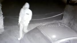 Hooded gunman fires two shots through elderly couple's home