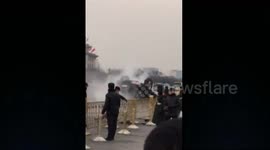 Car flips over because of slippery road in China