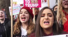 Thousands march against Trump's travel ban