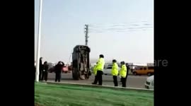 Car erects on road after crash