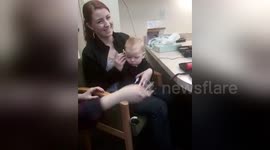 Baby hears his parents' voices for the first time