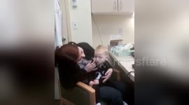 Baby hears his parents' voices for the first time