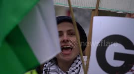 Pro-Palestinian protesters gather outside Downing Street for the arrival of Israeli Prime Minister