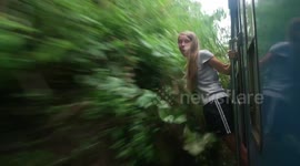 Woman cheats death during train trip in Sri Lanka