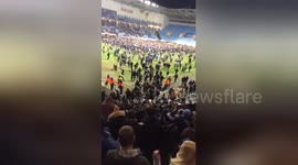 Coventry fans invade pitch after securing a final at Wembley