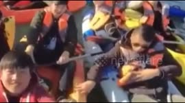 Kayaker drops phone in river while taking group selfie