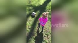Newsflare Edit - Cute Toddler tries to pick up a soccer ball