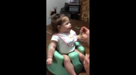 6 month old baby has to put her hair in a pony tail to eat her lunch!!!