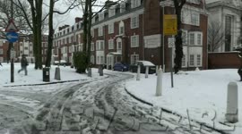 Kids playing after London's first winter snowfall