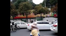 Cyclist kneel down to ask the driver not to call police