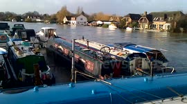 flooded boatyard on the Thames