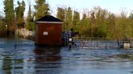 wrecked boat on Bell weir due to flooding
