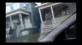 Man Jumps Out of 2 story roof trying to run from police and falls