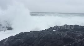 Daredevil cameraman gets hit by waves in British Columbia