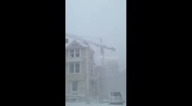 Nova Scotia blizzard wind spins crane