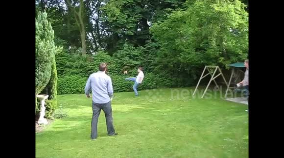 Newsflare Edit - Man tries to control football, kicks it into his own face