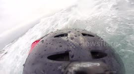 Powerful wave hits kayaker prompting emergency rescue