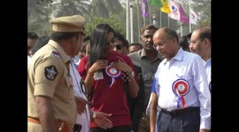 pv sindhu and officials walking with police escort