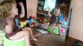 Ridiculously Cute Singing Toddler on the Potty -- With Shirt