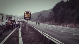 Motorists hold game of rugby on closed motorway