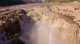 Aerial footage of Hukou waterfall on Yellow River during flood season