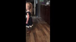 Sleepy toddler trying to be a big girl