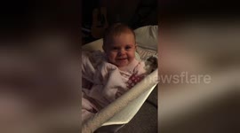 This baby loves the camera