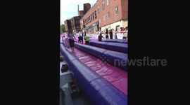 Cancer Research UK Water Slide in Norwich 04/07/15 Woman Slips Over