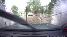 Severe storm forces motorists to drive through floodwater in Sydney